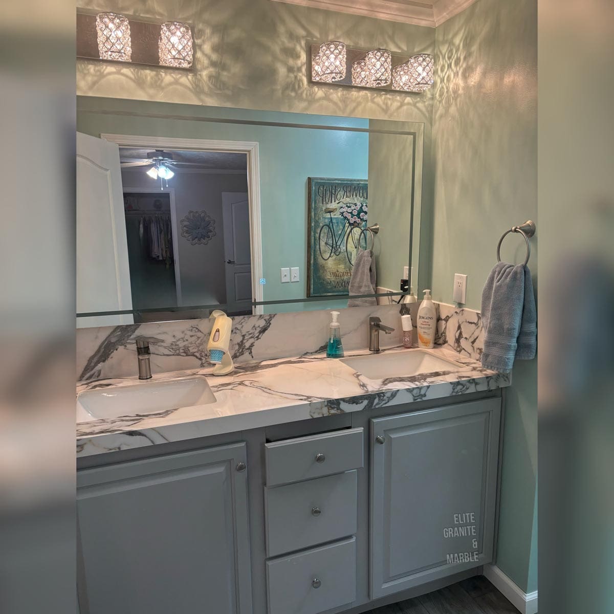 Newly installed bathroom countertop by Elite Granite & Marble